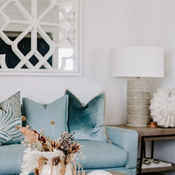 Caloundra unit renovation featuring coastal blue and white living room by sunshine coast designer and builder Coco Interiors