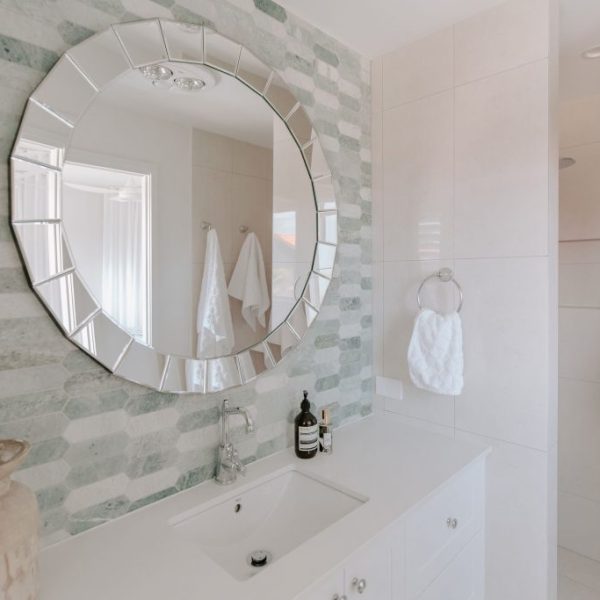 Maroochydore unit renovations – modern living room with coastal-inspired décor and light-filled interiors