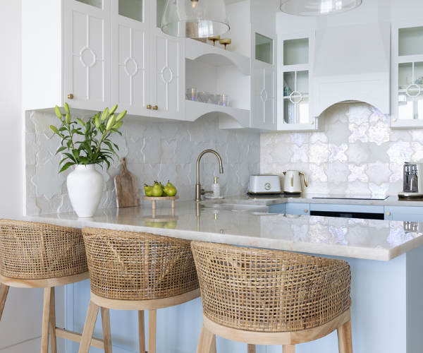 “Golden Beach unit renovations – light-filled living room with modern furniture and beach-inspired interior design”