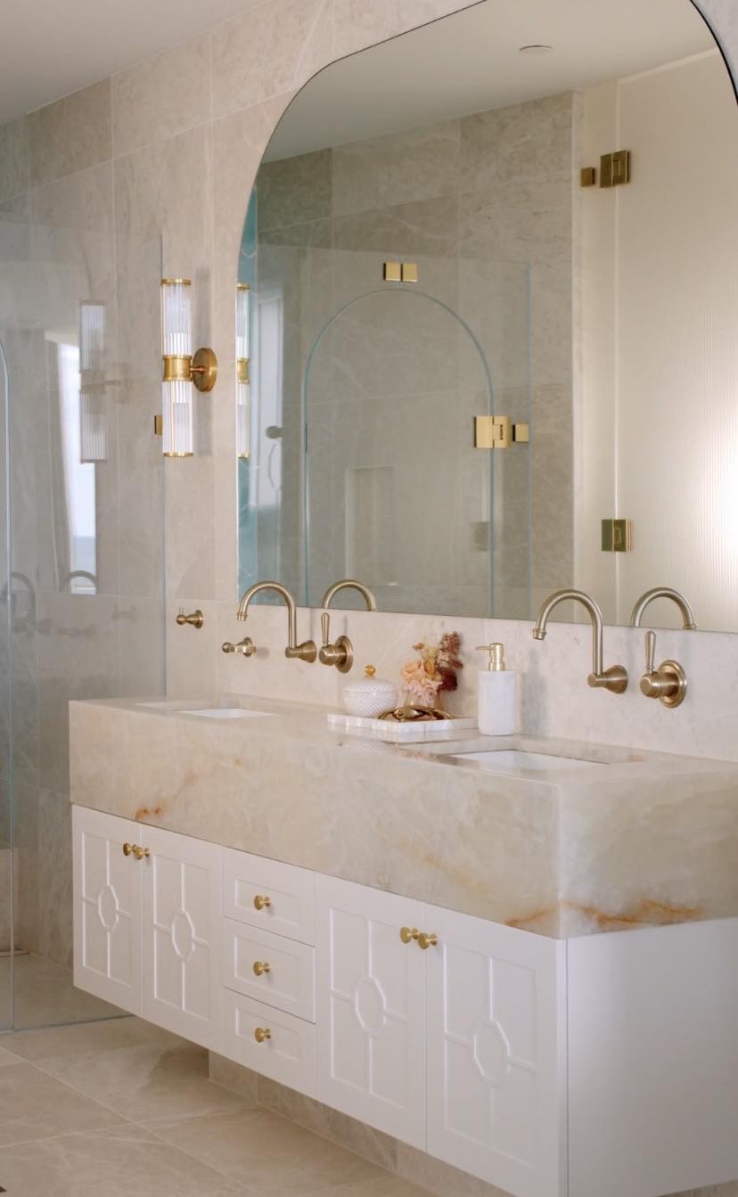 Glamorous luxury ensuite featuring bespoke cabinetry and elegant lighting, designed by Coco Interiors on the Sunshine Coast